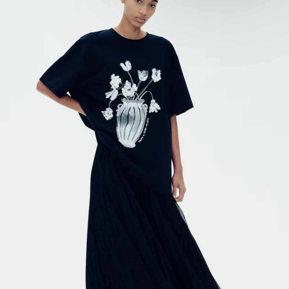 Black Graphic T-Shirt with Floral Vase Sequin Design